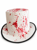 Chapeau haut-de-forme blanc à éclaboussures rouges effet faux sang et bord noir, sur fond blanc