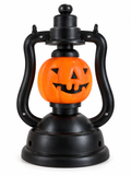 Lanterne décorative Halloween noire avec citrouille orange souriante sur fond blanc