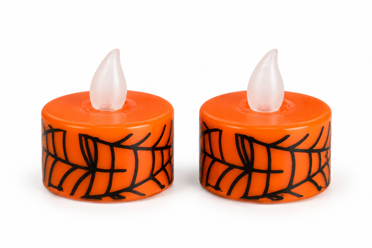 Lot de deux bougies LED orange Halloween décorées de toiles d’araignée noires sur fond blanc