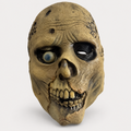 Masque zombie Halloween effrayant beige avec visage décomposé, dents apparentes, œil bleu et orbite noire sur fond blanc.