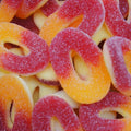 Bonbon rondelle pêche Trolli gélifié goût pêche à l’unité