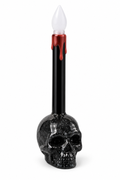 Bougie décorative Halloween noire avec tête de mort pailletée, coulures rouges et flamme blanche factice
